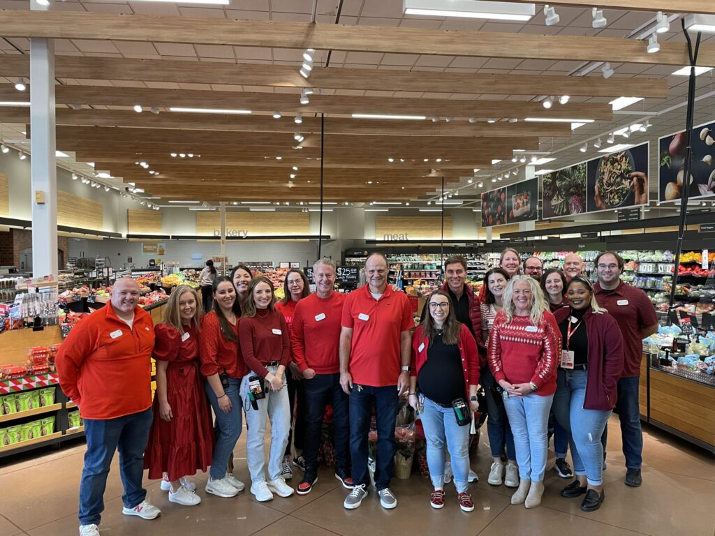Photo of Target employees posing in a Target store. Source: X